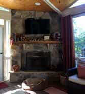 Outdoor fireplace with fall decorations
